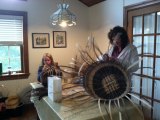 Leslie and Melinda are hard at work. Melinda's cat-head basket is coming along nicely.